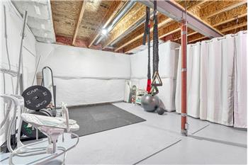 Create your own home gym in the unfinished basement.