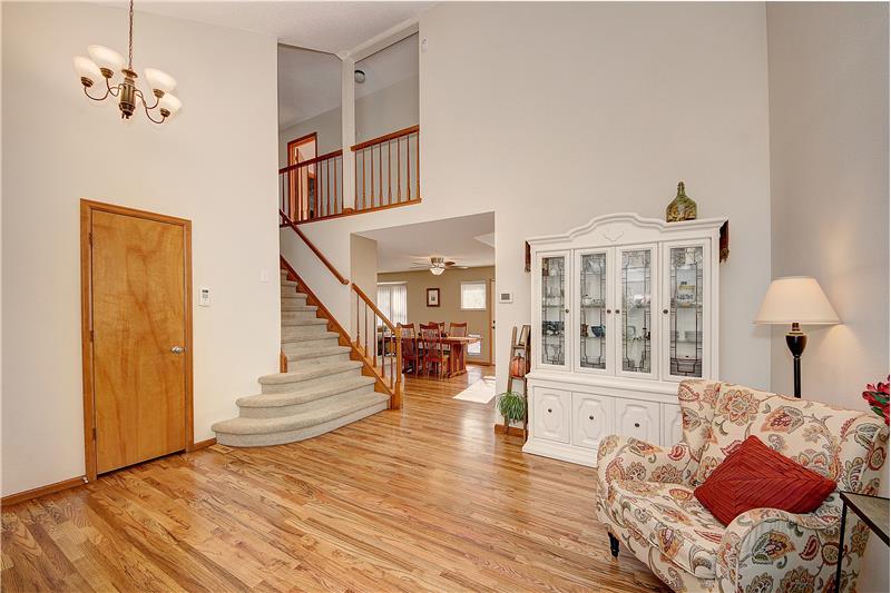 Formal living room with hardwood flooring