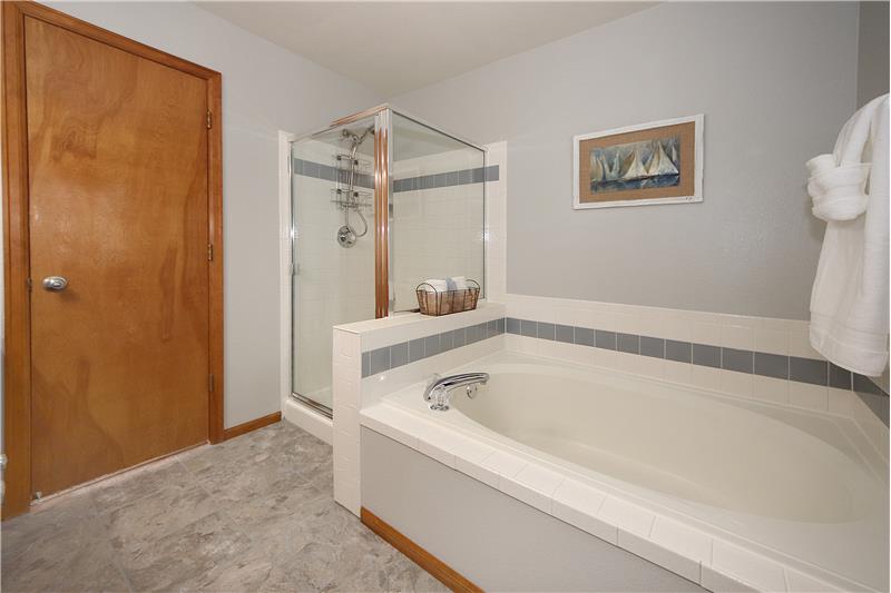 Master bathroom with new grouted vinyl tile flooring!