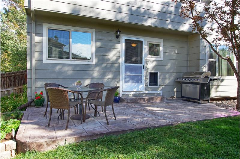 Enjoy BBQ's and watching the fireworks from the Sky Sox Stadium from this beautiful stamped concrete patio! Bonus dog door as we