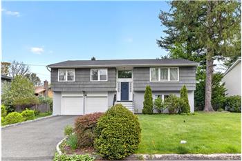 Perfectly situated in the heart of Hartsdale on a quiet cul-de-sac, offering comfort, convenience, close to town