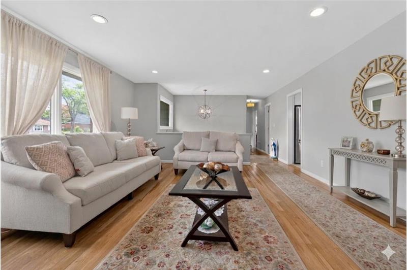 Grand Living Room, inviting and spacious grand living room offers a perfect blend of comfort and elegance