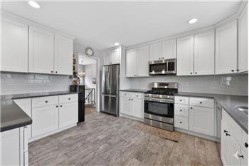 Gourmet Eat in Kitchen with stainless appliances to try out your best recipes and enjoy morning coffee