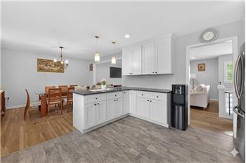 A modern living area open floor plan designed for effortless every day living and entertaining