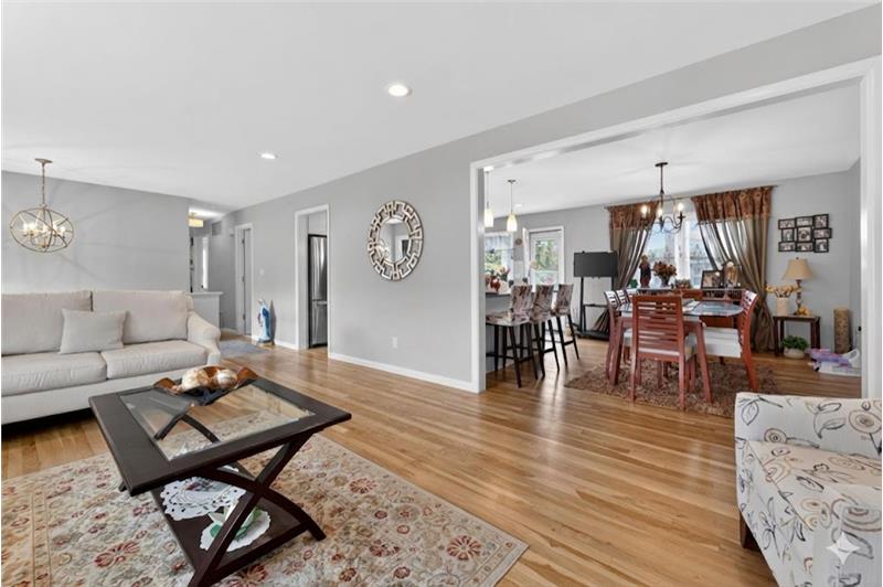 A seamless flow from the living room to dining area and kitchen creates the perfect balance of comfort for todays lifestyles