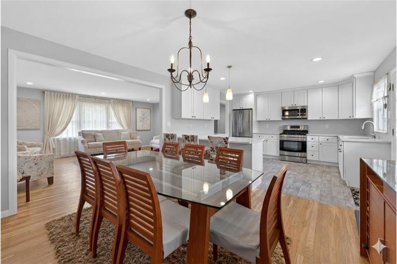 Dining area ideally situated for large table to welcome family and friend dinners