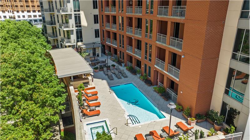 View of pool and outdoor recreation area from unit