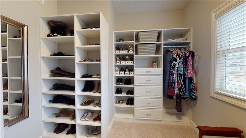 Plenty of room in this walk in closet!
