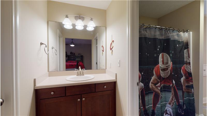 Adjoining bath for bedrooms 2 and 3.