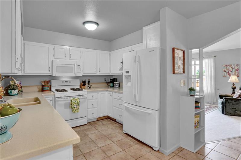 The Eat-In Kitchen is located off the formal Living Room making it easy to entertain