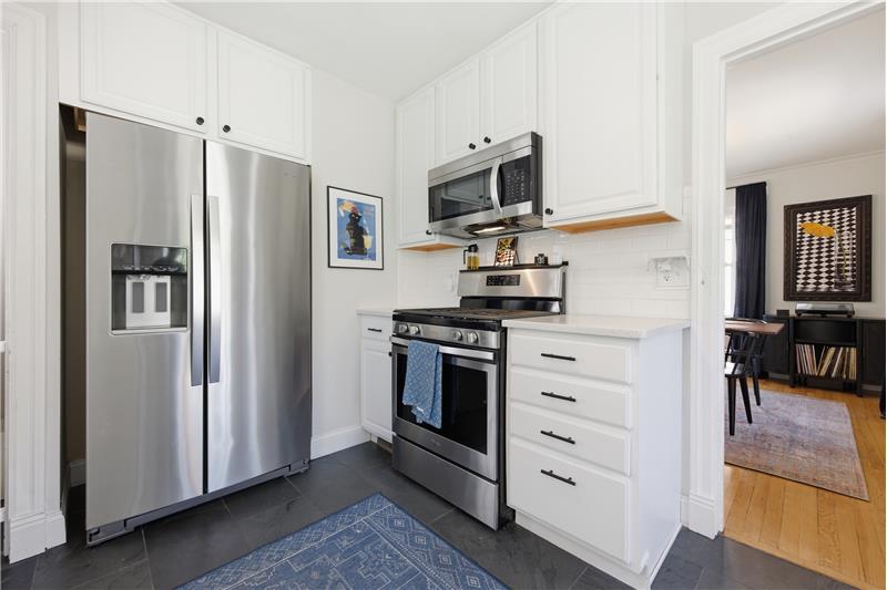 Gas stove, microwave and SS refrigerator all stay with the home.