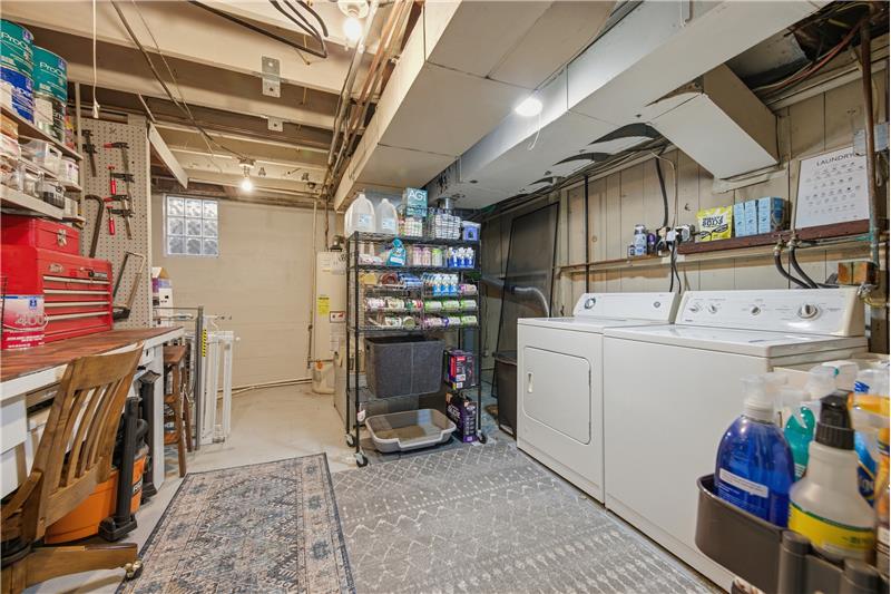 Utility room has the washer & dryer that stay with the house