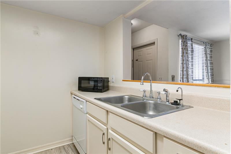 Kitchen View to Dining Area