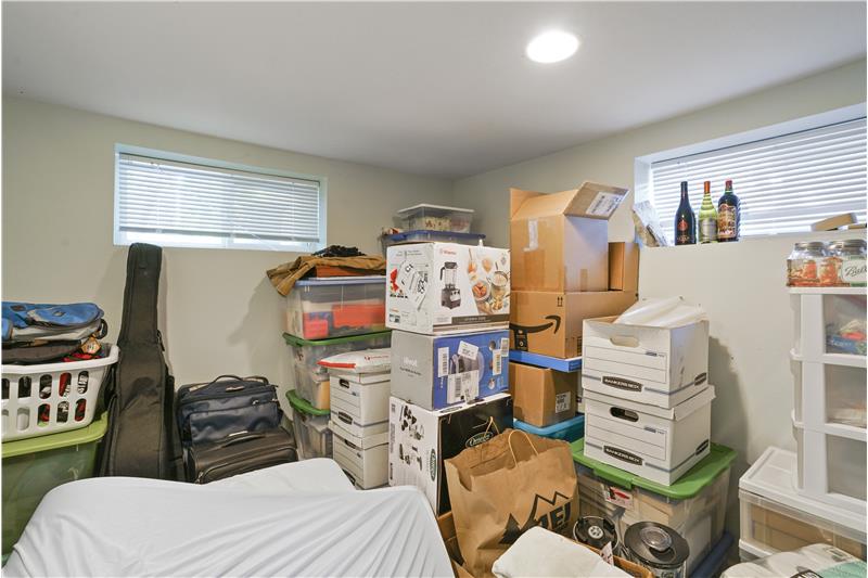 Storage room in basement, could be non-conforming 4th bedroom