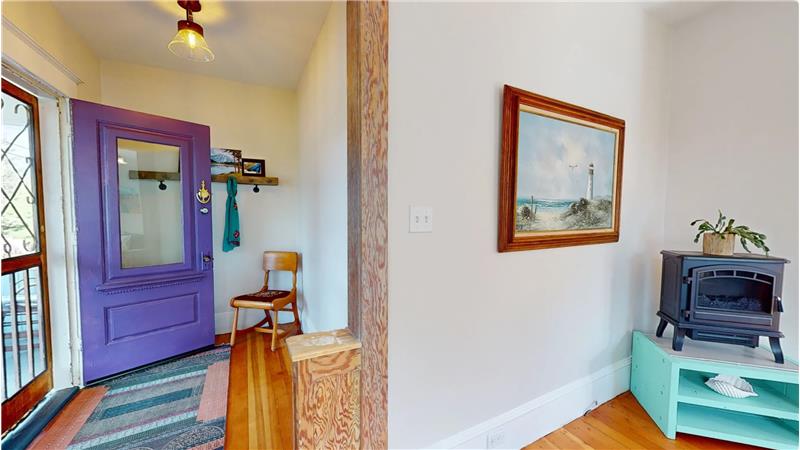 Entry with purple door open and partial LR