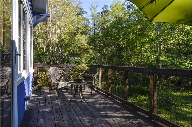 Enlarged back deck is a great place to take in what seems like your own private wildlife sanctuary.