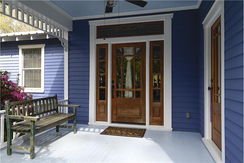 Pleasant front porch. Front bedroom has private entrance.