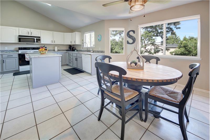 Spacious eat-in Kitchen with tile floors