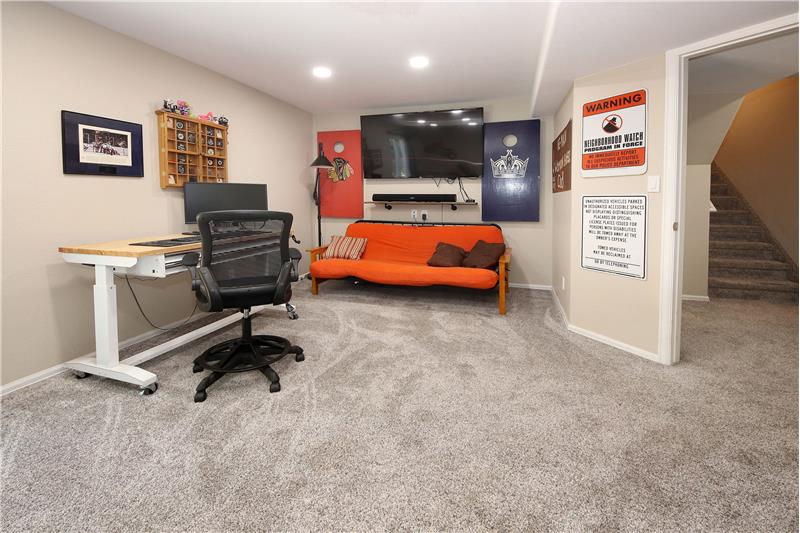 Basement Recreation Room with neutral carpet and recessed lighting