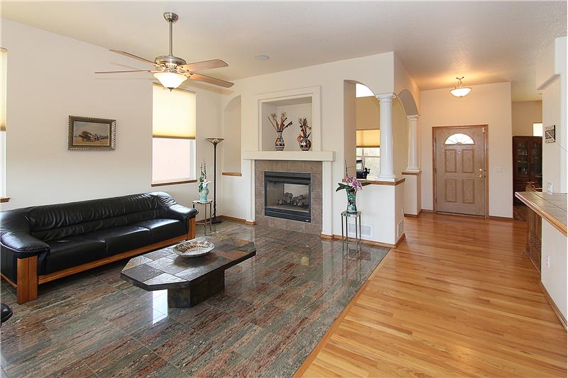 Living room with granite tile flooring