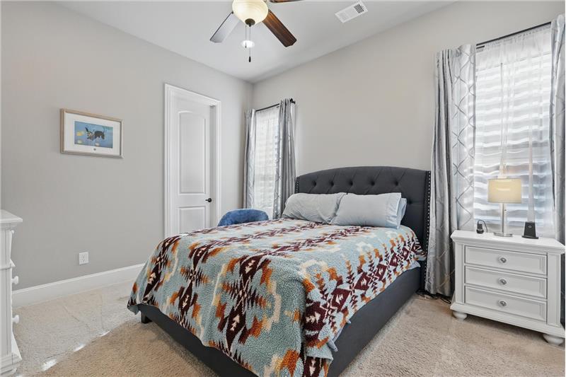 One of the three secondary bedrooms