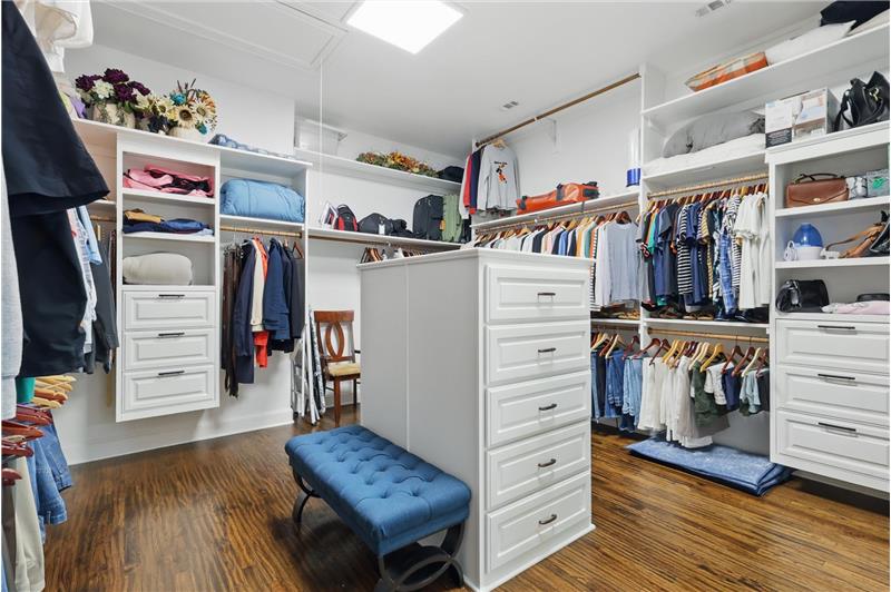 The closet of your dreams! Plenty of built in space for clothes and shoes!