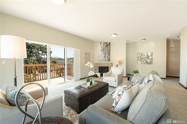 Living room, with sliding doors to deck