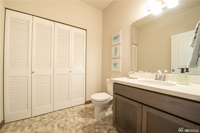 Main floor 1/2 bath + Laundry