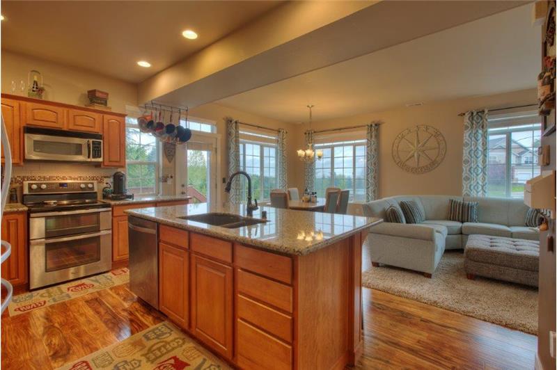 Enjoy the sunsets from your kitchen, Dinning room and Family room.