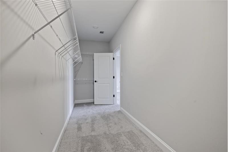 Primary walk-in closet