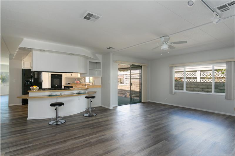 Huge Den next to kitchen