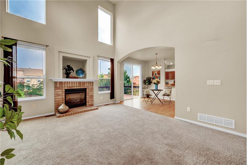 The Family Room flows into the walk-out Dining Area and Kitchen