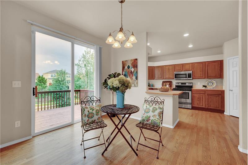 The Dining Room is off the Kitchen and has a slider out to the wood deck