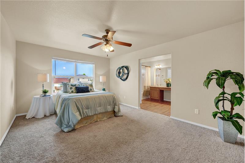 The vaulted Master Bedroom includes an attached 4pc Bathroom