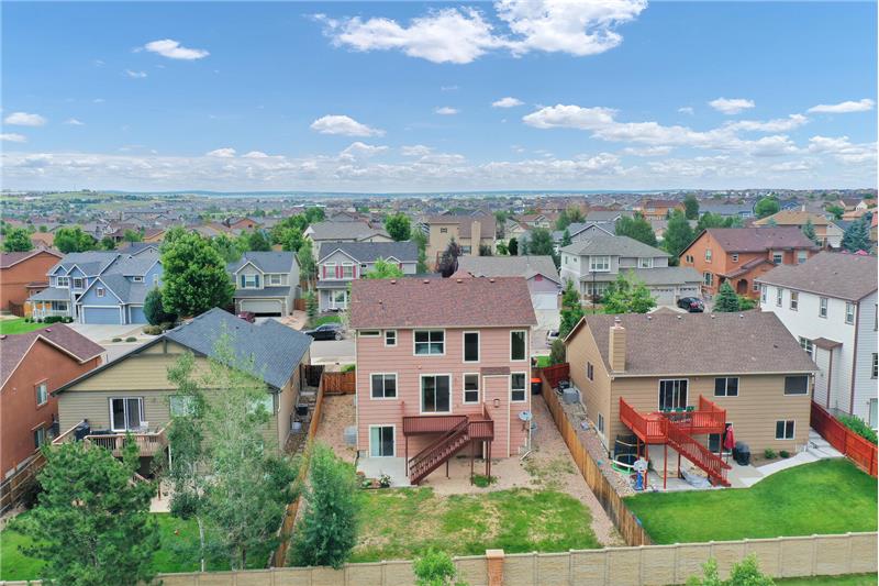 Aerial view of fenced backyard