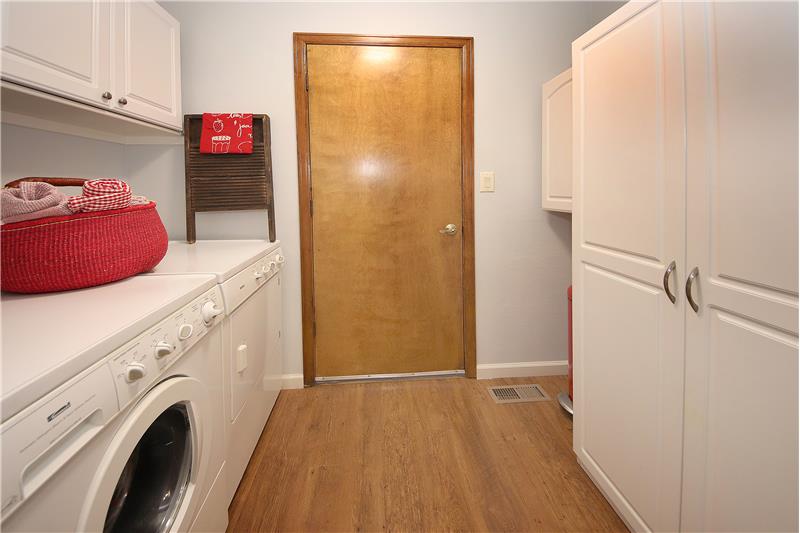 Laundry room with cabinets