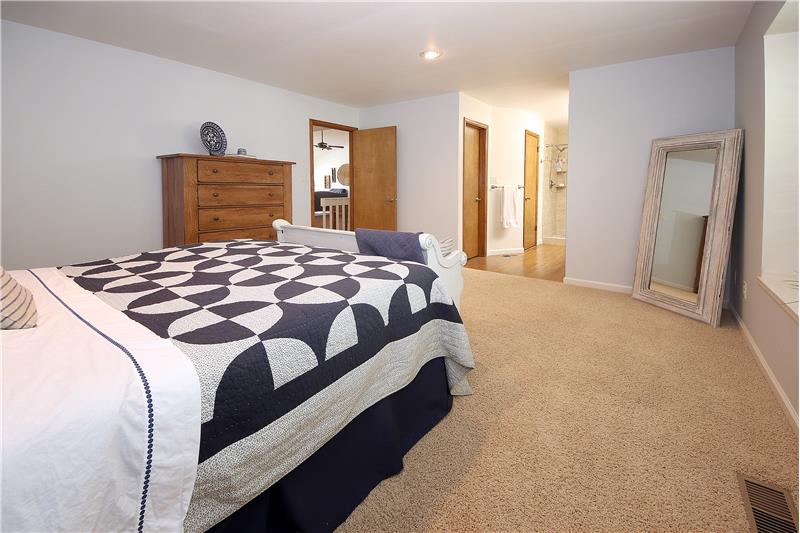View of master bedroom and adjoining 3/4 bath