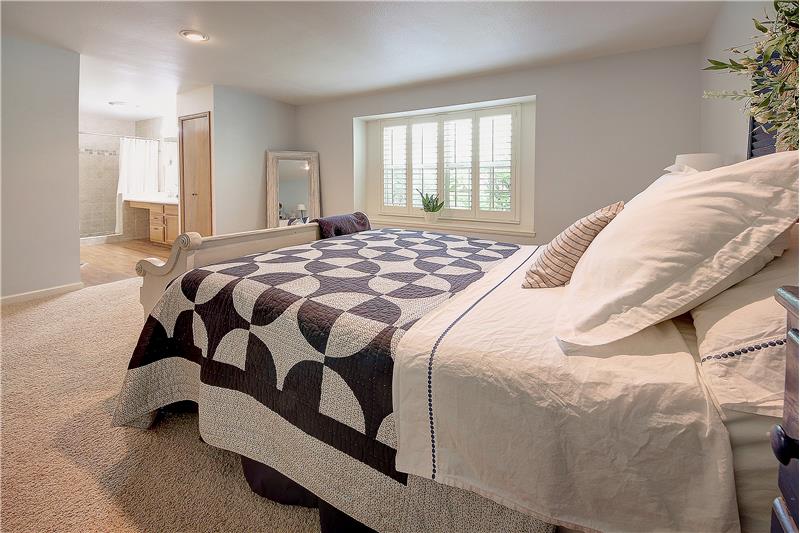 View of master bedroom and adjoining bath