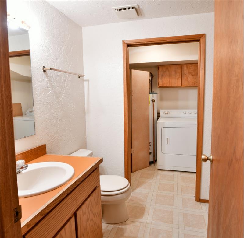 Still on the lower level you will find a 3/4 bath with laundry.