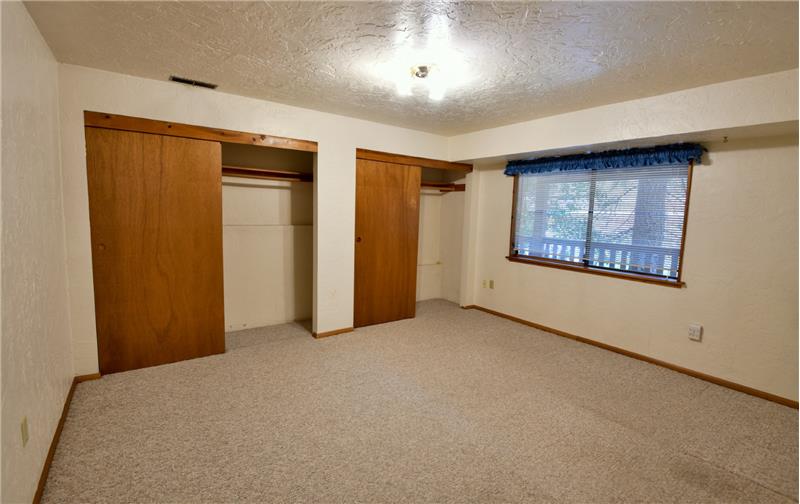 This bonus room could have so many purposes!  Office area, study area, or maybe even a guest bedroom with those closets.
