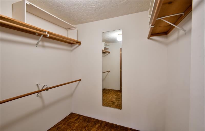 To the left is a large closet.  No worries about not having enough room for all your clothes and shoes!  Great dressing room!