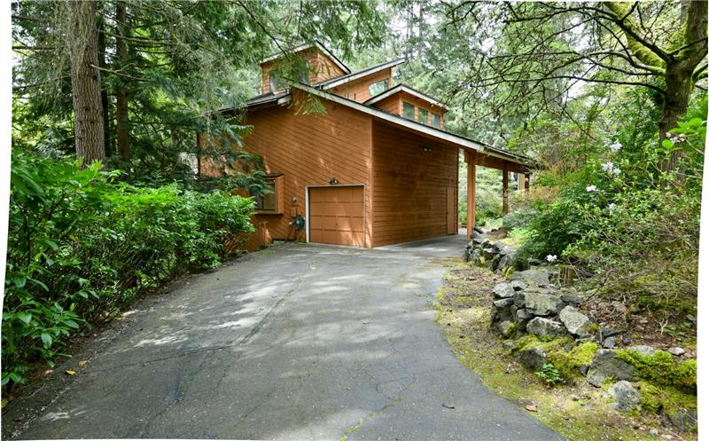 Large home on a 1/4 acre!  Located in a quiet established neighborhood.  Even better, it is a corner lot. Circular driveway!