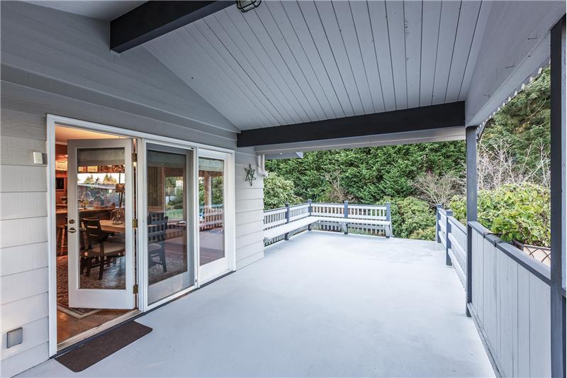 Enjoy the Spectacular Views from this Covered Deck or the Privacy of the Park Like Setting Back Yard. Great for Entertaining. 