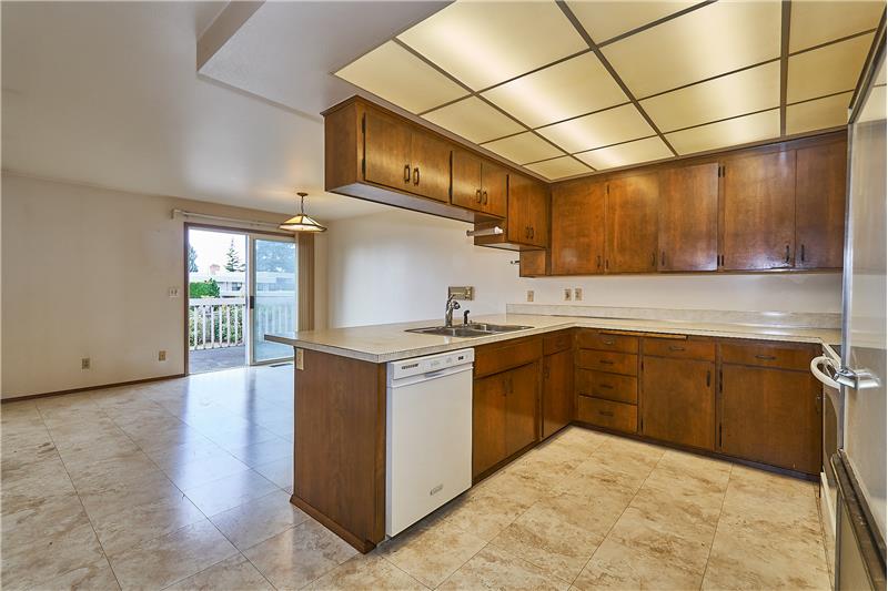 Kitchen and Large Eating Space with Ceramic Tile. All Appliances are Included.