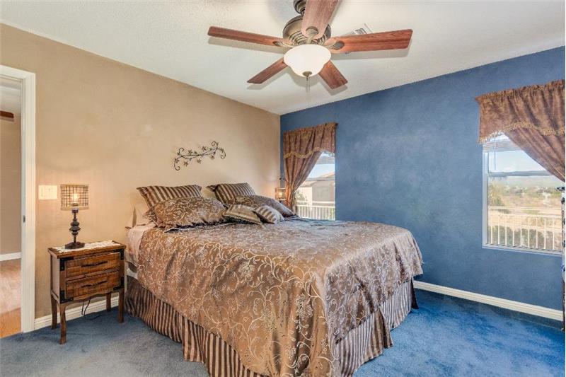 Master bedroom easily accommodates a king size bed and several pieces of furniture