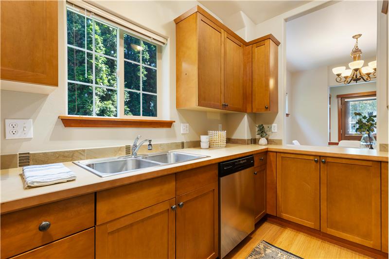 Kitchen equipped newer garbage disposal.