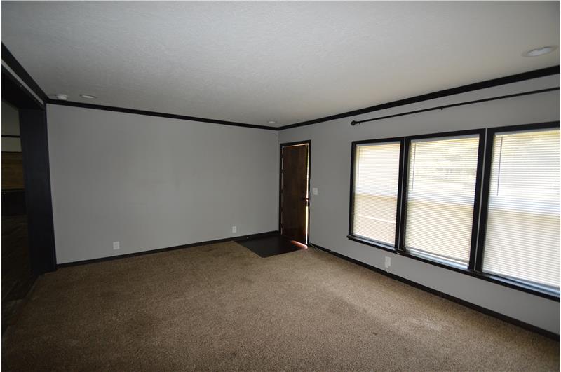 Living room with triple windows