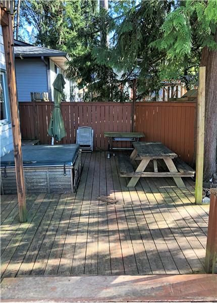 Yes, another deck. The hot tub does convey. Worked last time owners used it but it has been awhile.