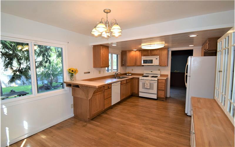 Plenty of room in this kitchen to cook, add a coffee bar and still have informal seating in the kitchen.
