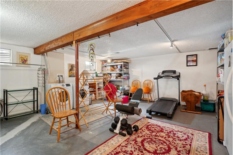 Laundry/exercise room in basement (finished except for concrete floor)